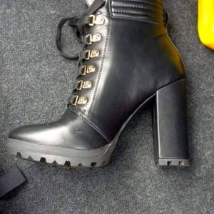 Heeled boots cute black brand new never worn